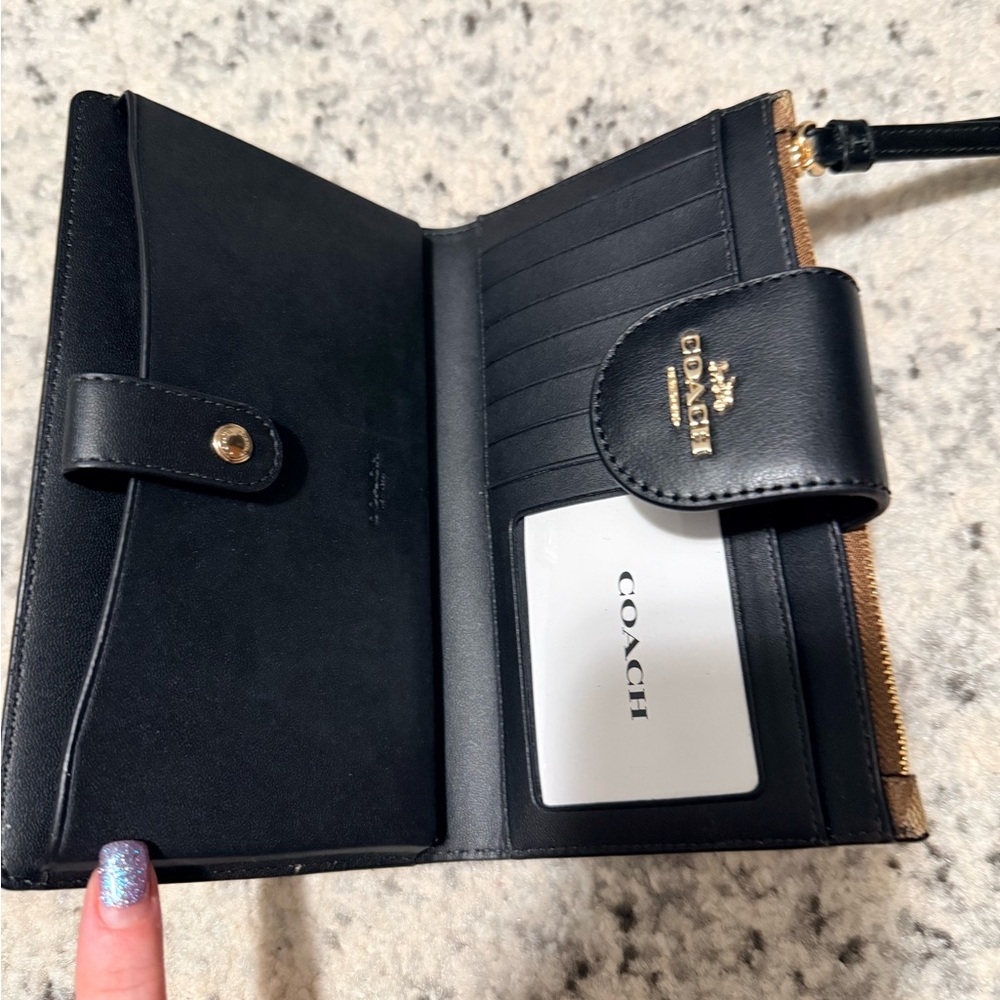 Coach Tan and Black Signature Wristlet - Picture 2 of 2